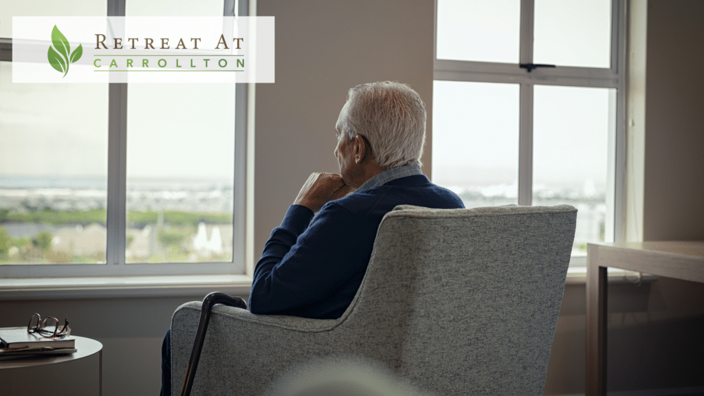 Overcoming the Fear of Fitting in at a Senior Living Community: an old man is sitting in an armchair, looking into the window and thinking